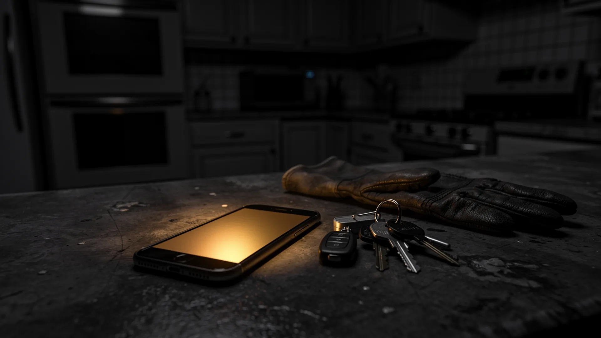 Phone glowing face up on a dark kitchen counter beside a ring of keys and a worn leather work glove